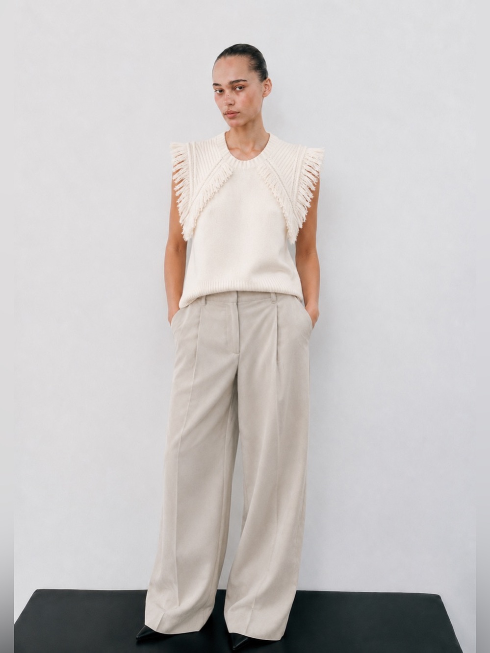 BCBG cream knit tank with fringe